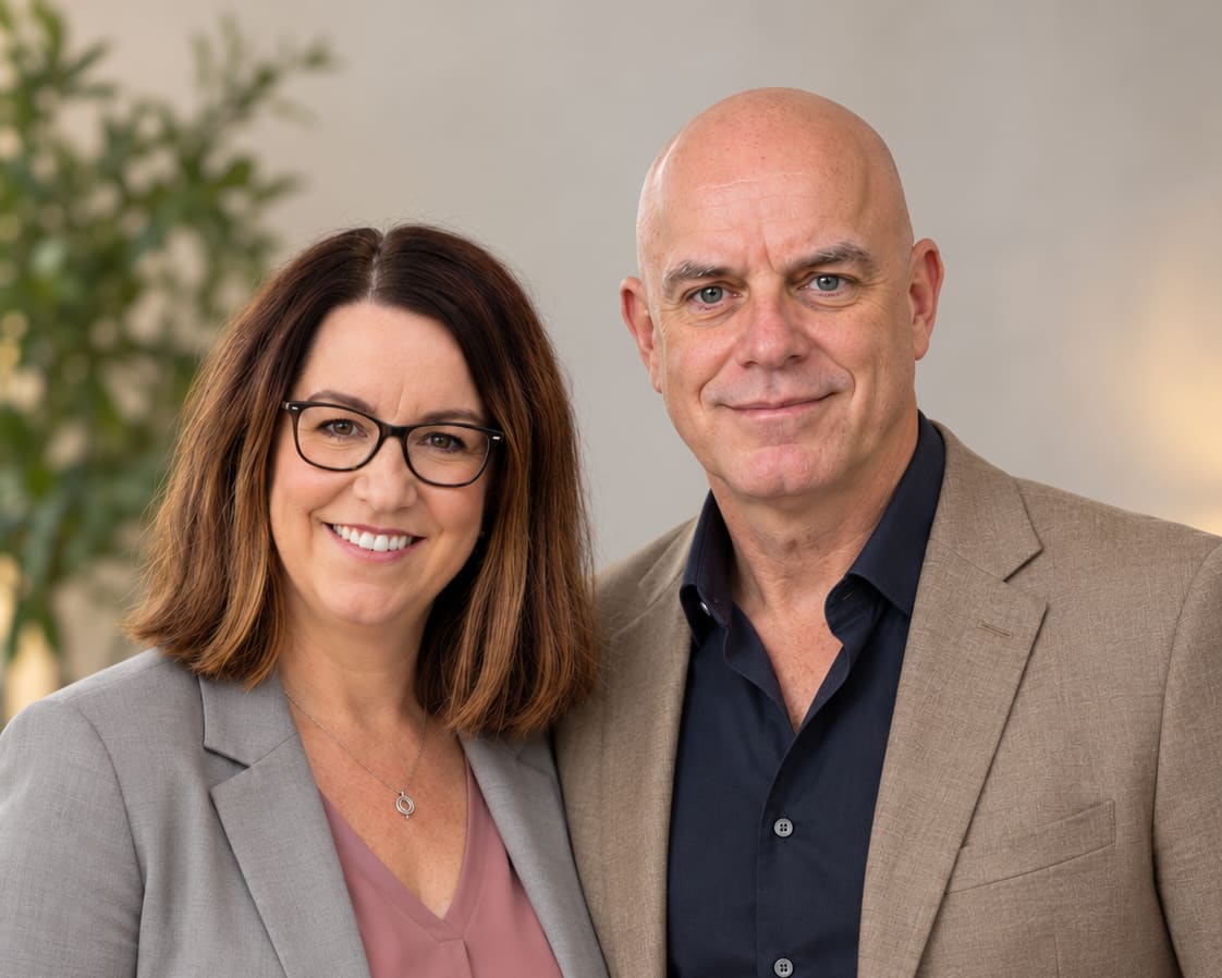 Matt DeWild and Molly Hinke-DeWild smiling together
